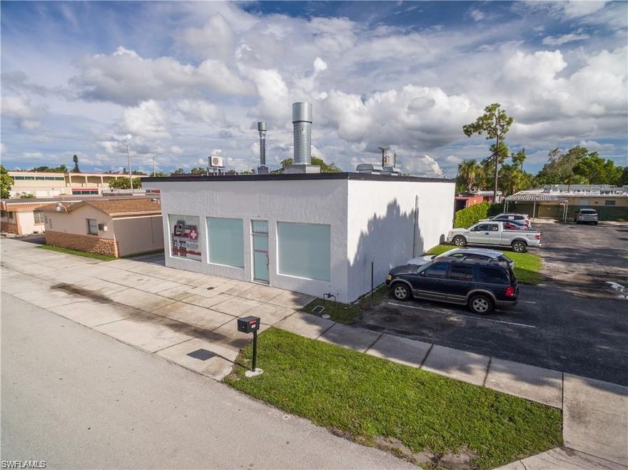 PRICED TO SELL!!  
Fantastic opportunity to buy a free-standing commercial building in the City of Fort Myers (right off US-41). The building has an amazing air-conditioned front showroom, ADA bathroom and owners' private office. The back flex space offers 2 rear bay doors with 13' clearance. The back parking lot is fenced with a large storage container for dry storage. Convenient side driveway allowing easy access to rear lot. So many different opportunities for this amazing industrial building.
