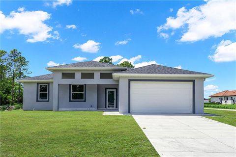 Photo of 1905 Charles AVE N, LEHIGH ACRES, FL 33971 (MLS # 226016675)