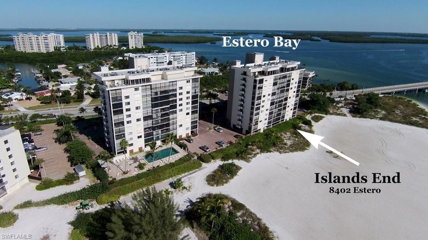 It's all about the view! This is a DIRECT Gulf unit with gorgeous white sand and Gulf views. Relax on the tiled lanai and just enjoy watching the water, beach and boating.  One wall of the lanai is custom mirrored so it appears that the sparkling blue water is all around you.  This 2BR/2BA turnkey furnished unit has updates to the open kitchen, including appliances (approx. one year old), large diagonal tile, countertops and a lighted tray ceiling.  The split floor plan offers privacy for both guest and owner.  The owner's suite is spacious with a walk-in closet, 3 piece bath and direct access to the lanai.  An in-unit washer and dryer makes laundry a snap.  Island's End amenities include 2 community pools, hot tub, fishing pier, tennis courts, BBQ grills and a kayak launch/storage. Use the trolley stop across the street to head to the north end of the island or just walk across Big Carlos Bridge to Lovers Key State Park. Island's End offers quick access to the airport as well as Bonita Springs restaurants and shops.