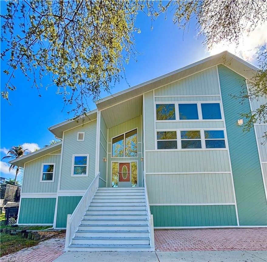 Welcome to the kind of home people move to Southwest Florida for!!

Fully Remodeled Pool Home with Bonus Space & RV Hookup!

This beautifully updated Southwest Florida pool home offers approximately 2,200 sq ft of main living space plus an additional 1,000 sq ft of flexible bonus space, providing endless possibilities for a home office, gym, guest suite, mother in law suite, media room, or additional living area.

Completely remodeled in 2022, this 4 bedroom 2.5 bath plus a den home features a bright open floor plan, soaring ceilings, and abundant natural light throughout. The updated kitchen flows seamlessly into the spacious living and dining areas, making the home perfect for entertaining or everyday living. The master bedroom has a private balcony and a master bath to die for with a wet room featuring a huge shower and soaking tub. For added convenience a washer and dryer connection is also installed so no lugging clothes or towels up and down stairs.

Step outside to enjoy the screened-in pool and spa, surrounded by a generous patio area ideal for relaxing or hosting guests while enjoying the Florida lifestyle.

Additional highlights include updated pool equipment, an oversized water heater, and RV hookup, a rare and highly desirable feature for homeowners with recreational vehicles or extra storage needs. There is even a community boat dock with Gulf access!

With modern updates, flexible living space, and resort-style outdoor living, this move-in-ready home offers the perfect combination of comfort, style, and functionality.

Don't let this piece of paradise pass you by!