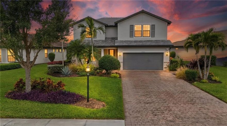 Located in the gated, resort-style community of The Place at Corkscrew, this inviting two-story home offers peaceful marsh views, west-facing sunset exposure, and well-designed indoor and outdoor living spaces. Built by Pulte Homes, the Citrus Grove floorplan provides 2,859 square feet of living space with four bedrooms, a first-floor den, an upstairs loft, and 2.5 bathrooms. The primary suite is located on the main level, while three additional bedrooms and a spacious loft upstairs offer flexibility for guests, work-from-home needs, or everyday living. A 2-car garage with a 4-foot extension adds extra storage.
The interior features wood-look laminate flooring in the main living areas, white cabinetry, quartz countertops, and tray ceilings in the great room, den, loft, and primary suite. Additional highlights include a custom fireplace and TV feature wall, impact-glass front door insert, glass-enclosed primary shower, mini-split climate control in the garage, and a dedicated attic storage room.
Outdoor living is easy to enjoy year-round with a custom saltwater pool featuring a lagoon-style finish, sheer descent waterfalls, LED lighting, a modular outdoor kitchen, and a covered lanai overlooking the marsh. The west-facing orientation creates a comfortable outdoor setting with beautiful sunset views.
Residents enjoy a wide range of amenities, including a resort-style pool with waterslide and spa, indoor dining options, café, bourbon bar, outdoor bar, large fitness center with childwatch services, movement studio, tennis, pickleball, bocce, basketball, playground, dog park, spa services, and two manned guard gates staffed 24/7. Fencing is permitted.
Conveniently located near I-75, approximately 20 minutes from Southwest Florida International Airport, and close to Miromar Outlets, Gulf Coast Town Center, and Coconut Point, this home offers a comfortable lifestyle in one of Southwest Florida’s most desirable communities.