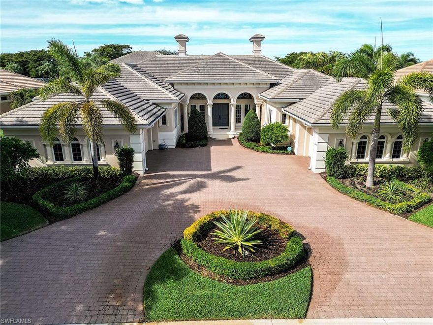 Spectacular Frey & Son custom estate home in the exclusive Oak Brook neighborhood within Shadow Wood. Breathtaking lake & golf course view. Updated throughout with many custom upgrades, including Wood Mode custom cabinetry, wood floors, quartz countertops in the kitchen, and bar area. New pool heater. Natural gas generator. Gorgeous new light fixtures. Beautiful master bath, replete with quartz counters and a soaking tub.  Generous guest bedrooms, all with ensuite baths. Pool bath serves a huge lanai with plenty of undercover protection from the sun. Large outdoor kitchen.   Spacious den with built-in desk and cabinetry.  2019 roof. Fiber to the home provides lightning fast internet and television.  Member owned Shadow Wood Country Club offers 54 holes of championship golf, 2 club houses, 9 Har Tru tennis courts, bocce, outdoor fire pits, access to a private beach club, fitness center, full-service spa, pickle ball, and private restaurant. New Lifestyle Amenity Center will add 2 resort style pools with zero-depth entry, lap lanes and dedicated kids pool, poolside restaurant & bar, 6 indoor pickleball courts, new racquet pro shop and a grab & go cafe.  Great location close to shopping, airport, beaches and much, much more.