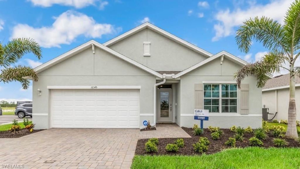 Photo of 16544 BLUE CORAL LN, NORTH FORT MYERS, FL 33903 (MLS # 225083124)