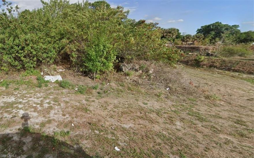 Let us help you find your DREAM BUILDER for your DREAM LOT! This .40-acre lot with eastern exposure is located in Lehigh Acres and is PRICED TO SELL! In a newly developed area, you'll love the quiet location of this lot ... at the end of a street with a fresh water canal running along the side. Gunnery Rd offers easy access to Daniels Pkwy, while SR82 takes you right into the downtown Fort Myers River District ~ where you'll enjoy a myriad of boutique shopping and unique dining experiences! Monthly events in the River District include Bike Night, Art Walk, Music Walk, and more! Also just a short drive away is Westminster Golf & Country Club ~ a semi-private championship golf course with restaurant, offering lunch, dinner lite fare & full bar. X FLOOD ZONE. Buy and hold; buy and build - the choice is yours! At this price, it's time to MOVE!