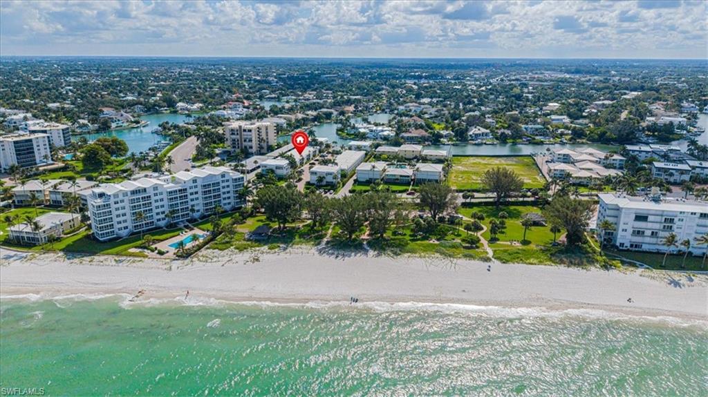 Photo of 2100 Gulf Shore BLVD N #111, NAPLES, FL 34102 (MLS # 226023557)