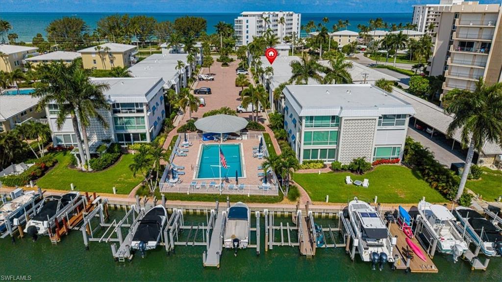 Photo of 2100 Gulf Shore BLVD N #111, NAPLES, FL 34102 (MLS # 226023557)