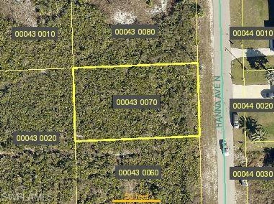 Don't miss out on this desirable Lehigh lot to build your new home. Located just a short drive to grocery stores, schools and other amenities. - (RSW Southwest International Airport), Fort Myers Beach, JetBlue Stadium (Home of the Red Sox Training Facility) Activities nearby include Lehigh Acres Community Park North; Lehigh Acres Trailhead Park; Caloosahatchee Regional Park with sprawling, nearly 770-acre park featuring trails for mountain biking & hiking plus campsites & more. SW Florida living is truly paradise, Lee County Manatee Park up-close views of manatees, an amphitheater & kayak rentals.