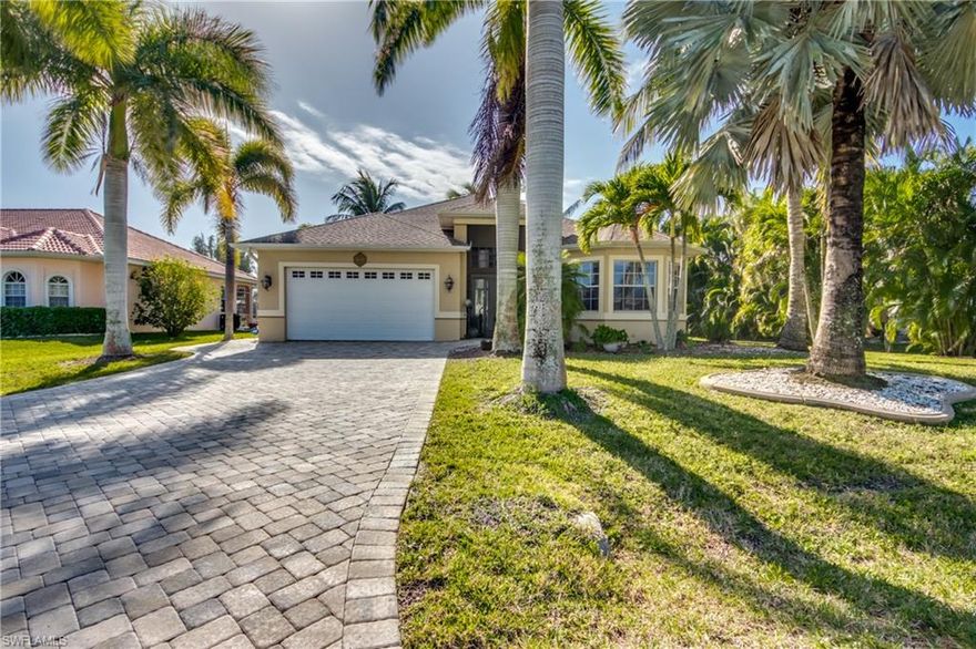 Beautiful, well maintained gulf access three bedroom two bath home with tile throughout, lush landscaping & mature palm trees.  Minutes by boat to Matlacha Pass, navigate further to the islands of Ft. Myers Beach, Sanibel, Captiva, Pine Island, Useppa, Captiva, North Captiva and the Gulf of Mexico. Very large paver lanai with heated swimming pool, wrap-around boat dock with Tiki Hut (recently updated) 10,000 lb. boat lift. Pavers on driveway, front entrance lanai and walkway to the large dock. Located in a very quiet neighborhood, close to shopping, houses of worship, restaurants, schools etc. Being sold furnished - City Sewer & Water installed, Assessments paid in full. New A/C 2016, new Washer & Dryer.