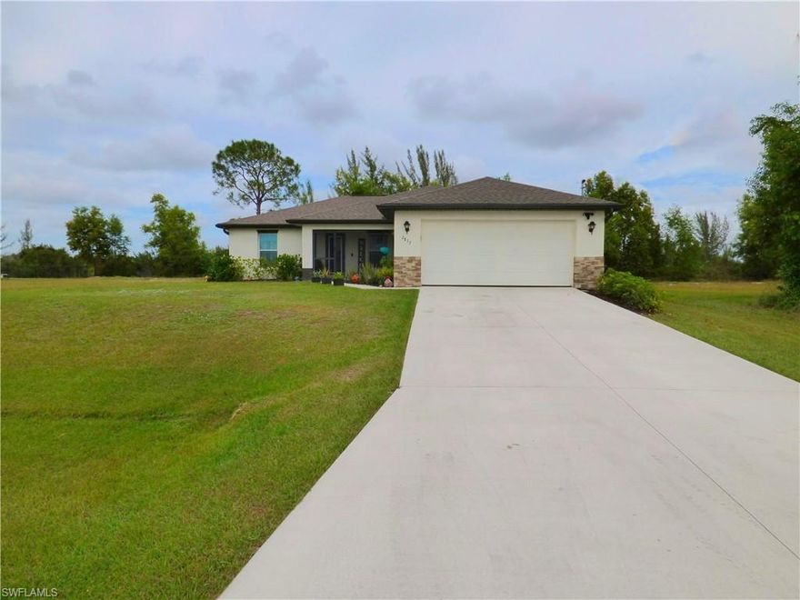 Now available, this "like new" home is only 3 years old, and move-in ready. Sanibel "Signature" Series model. Beautiful 3 bedroom home in NW Cape Coral. This home sits on an oversized lot, with a massive back yard that backs up to a small, always flowing, fresh body of water with an array of wildlife. On the other side is a large wooded area with lakes. Under truss lanai, Lenox 14 Seer high efficiency AC, Moen plumbing fixtures, dimensional shingles, PGT Low E Insulated windows, Real wood cabinets, stainless steel appliances, 18" tile flooring in wet areas, and indoor laundry.  This home has also received many upgraded fixtures such as lighting, fans, and other improvements since being built. Why wait to build a new home? This home has plenty of room for a pool, while keeping the backyard large and spacious. Instead of putting a large deposit down to build a home and take those risks, set that money aside to add a pool. Make the private backyard your oasis.  Many Cape Coral lots have room for a pool, yet only leave 10 feet of backyard when finished.  This yard goes 25 feet deeper than average. Quiet area, very low traffic. Click the link for additional pictures, including aerials.