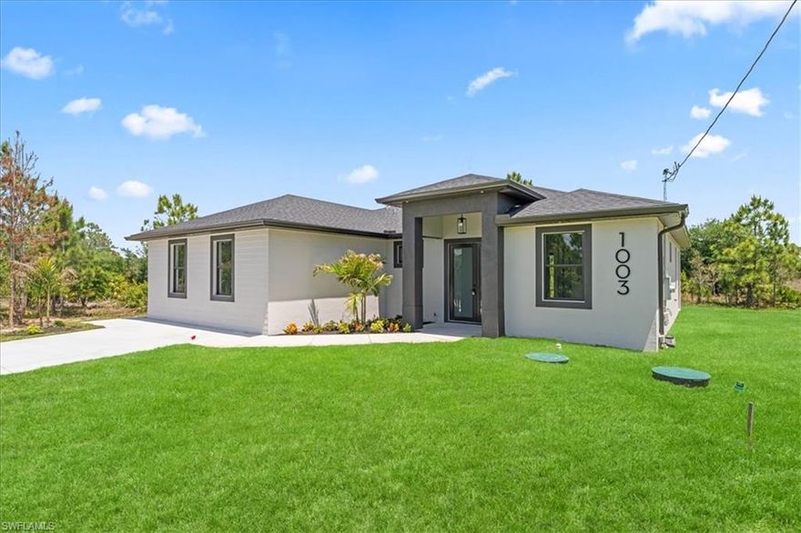 Welcome to this stunning new construction home in Lehigh Acres, designed with modern style and functionality in mind! This beautifully crafted property offers 4 bedrooms and 3 full bathrooms, perfect for families, multi-generational living, or investment opportunities.

Step inside to find elegant porcelain tile flooring throughout the entire home, including the entry and covered terrace, creating a seamless and upscale feel. The open-concept layout provides a bright and inviting atmosphere, ideal for both everyday living and entertaining.

One of the standout features of this home is the private in-law suite, complete with its own sink and counter space ready for a kitchenette—perfect for guests, extended family, or even rental potential.

Enjoy Florida living at its best with a spacious covered terrace, ideal for relaxing or hosting gatherings while overlooking your backyard.

Seller concessions available!!!!!!

? Highlights:

4 Bedrooms | 3 Bathrooms
Modern design with clean lines and great curb appeal
Porcelain tile throughout (no carpet!)
In-law suite with kitchenette setup
Covered terrace for outdoor living
Large Driveway with plenty of parking space 

Located in a growing area of Lehigh Acres with easy access to SR-82, shopping, and dining.

?? This home is perfect for buyers looking for flexibility, style, and income potential all in one.