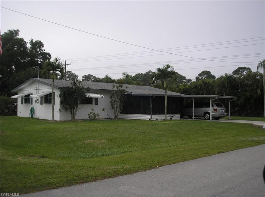 This is a clean neat two bedroom, one & half bath home with outside shower too.  There are three enclosed screened porches for your entertaining.  Clam Shell type shutters.  This is a real home and  it  priced right.