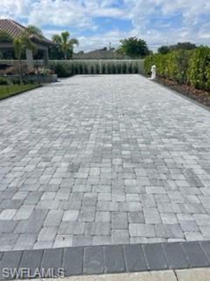 Welcome to 13410 Golden Palms Circle, Fort Myers, FL. This motorcoach lot is HUGE, .27 acres, with a Huge screened pavilion. There are so many upgrades including granite countertops, a high-end outdoor kitchen with grill, smoker, griddle, burner, and a new refrigerator. This space is excellent for entertaining. The magnificent wood ceiling and 2 ceiling fans gives the feeling of next level luxury. This super-sized lot has fabulous landscaping, landscape lighting, and even has its own irrigation system. The extra large paver pad with seating areas, outdoor fire pit, and a unique brick paver flower/planter box wall provides unique outdoor living options as well. This could be your very own piece of paradise for your Class A or Super C Motorcoach. You can even keep your stacker trailer on your lot if painted to match your motorcoach. Located within Golden Palms Luxury Motorcoach Resort you will have access to activities and amenities for everyone including a heated pool, spa, sauna, pickleball courts, exercise room, a 1-acre dog park for your furry friends, & a 22-acre lake for catch and release fishing. 
You will be surrounded by nature but only a short drive to restaurants, shopping, golf courses, airports, baseball spring training stadiums, & beaches.
It would be my pleasure to work with you!