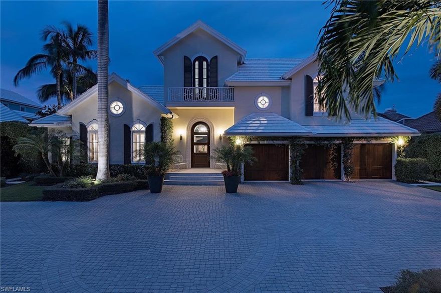 Tropical paradise is found at this island-style courtyard home perfectly sited in Port Royal. This enchanting fully-furnished and decorated residence offers the utmost in privacy with an open-air enclave that complements the interior spaces with warm sun and natural light through its walls of French doors. An unrivaled beauty is evident at every turn with custom works of art that include Venetian plaster, natural oak flooring, beautiful millwork, specially-designed coral and shell chandeliers, distressed antique mirrors, and Phillip Jeffries wall coverings just to name a few highlights. Flanked by spacious and stylish living and dining spaces is the modern kitchen which encompasses glass and stainless steel cabinetry, quartzite countertops, and top-end appliances that include Sub-Zero, and Viking. The spacious master suite boasts two custom dressing rooms and an en-suite bath appointed in glass tile outfitted with custom built-ins, Victoria + Albert freestanding tub and floor-to-ceiling windows that allows tranquil views of the shady garden alcove. This remarkable home represents incomparable luxury and offers close proximity to the Beach Club and its recreational amenities.