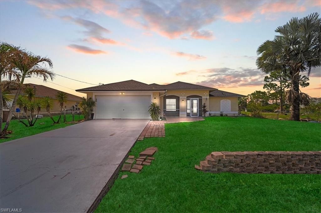 Photo of 1019 Angelo AVE, LEHIGH ACRES, FL 33971 (MLS # 226011908)