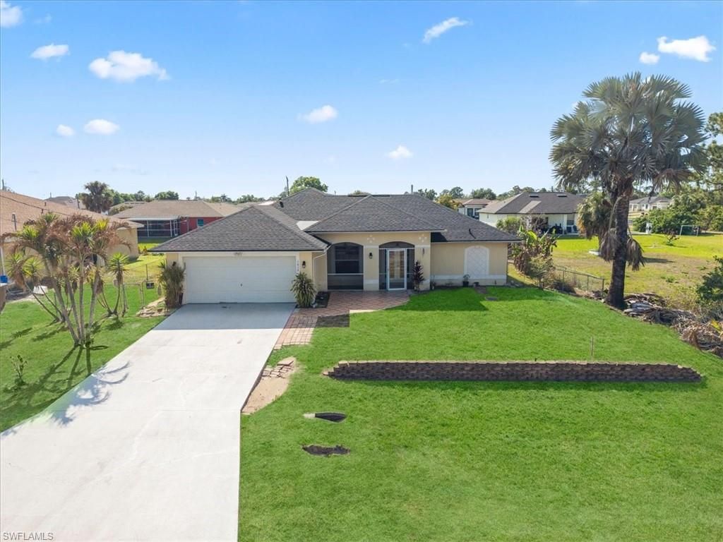 Photo of 1019 Angelo AVE, LEHIGH ACRES, FL 33971 (MLS # 226011908)