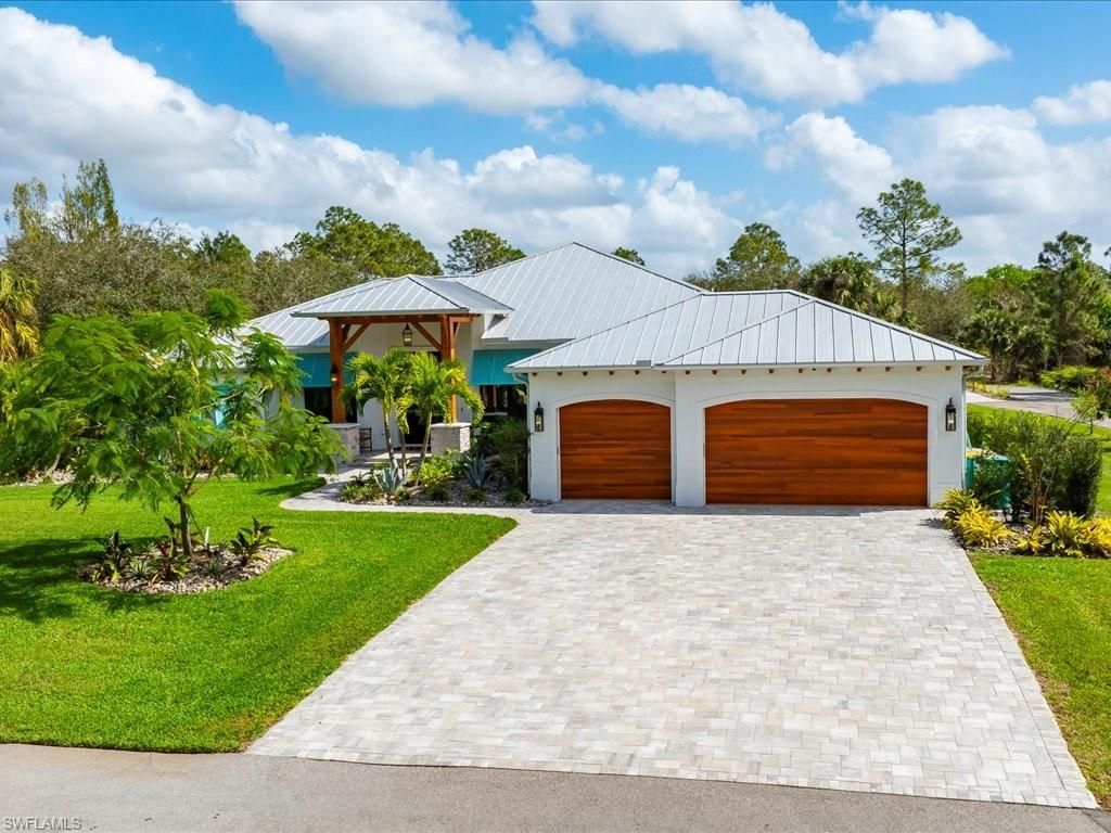 Photo of 2590 2nd ST NW, NAPLES, FL 34120 (MLS # 226006021)