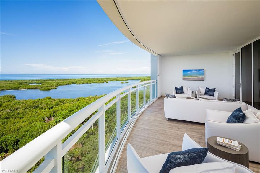 Built in 2020 & no storm damage! Enjoy spectacular sunsets from the 17th floor of this rarely available south-west facing end unit at Kalea Bay. Expansive floor-to-ceiling windows provide stunning panoramic views of the Gulf of Mexico and Pelican Isle Yacht Club. The private elevator delivers you to the professionally decorated home being sold furnished. Beautiful hand-scraped Legno Bastone wood floors, gourmet kitchen with Wolf and Sub-Zero appliances, quartz waterfall island, butler’s pantry with custom cabinetry and Sub-Zero wine refrigerator, are just some of the many upgrades. All bedrooms feature en-suite baths and walk-in closets with custom built-ins. In addition to top-of-the-line impact windows and doors, the balcony has been upgraded with storm shutters to protect your outdoor furnishings. Enjoy the rooftop pool, social room, gas grills and open-air fitness. The Kalea Bay Club offers five-star resort amenities, wellness center, three pools, restaurants, pickleball, tennis, kids game room and overnight cottages for guests. Don’t miss the opportunity to own a sensational property in one of Naples' most prestigious resort style communities.