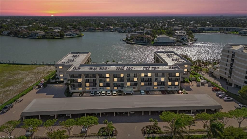 Photo of 3200 Gulf Shore BLVD N #106, NAPLES, FL 34103 (MLS # 225080275)