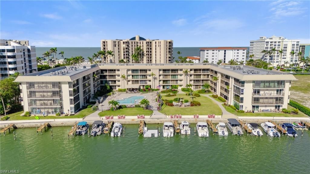 Photo of 3200 Gulf Shore BLVD N #106, NAPLES, FL 34103 (MLS # 225080275)