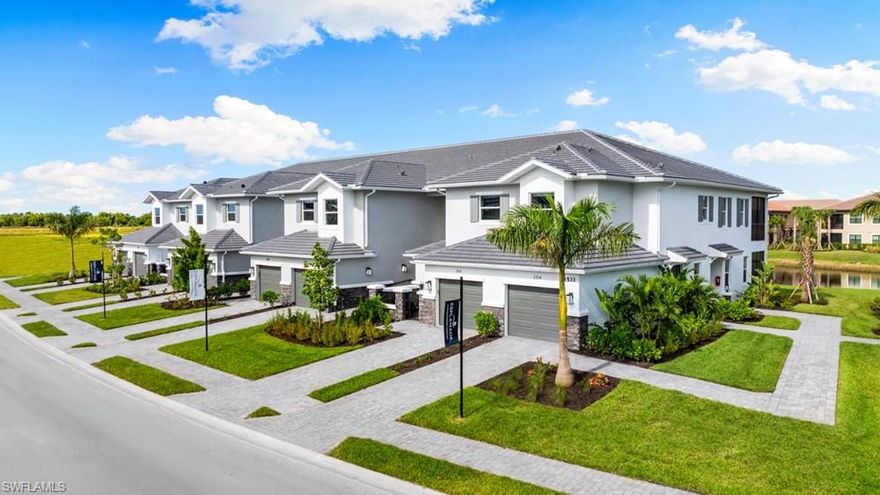 What's Special: Lake View | Close to Amenities | Covered Lanai | Large Kitchen Island | High Ceilings. New Construction - Ready Now! Built by America's Most Trusted Home Builder. Welcome to the Vitale at 15336 Giardino Drive Unit 102 in Esplanade by the Islands Coach Homes! This new first-floor coach home offers a bright and spacious central living area designed for easy, comfortable living. The gathering room flows into the designer kitchen and dining area, highlighted by quartz countertops and shaker cabinets, and features a cozy fireplace for added warmth and charm. Sliding doors lead to a covered lanai, and whole house impact windows provide peace of mind throughout. The tucked-away primary suite includes an en-suite bath and a generous walk-in closet. A secondary bedroom, full bath, laundry room, and a one-car garage complete this thoughtful home. Additional Highlights Include: Cafe appliance package, washer and dryer, refrigerator, whole house blinds, and upgraded tile flooring. Photos are for representative purposes only. MLS#226010980 - Esplanade by the Islands Coach Homes offers an unparalleled lifestyle with resort-style amenities and wellness programs to inspire and invigorate. Whether you’re seeking active adventures or peaceful retreats, this community delivers luxury and sophistication at every turn. Swim laps or lounge by the resort-style pool, sip a refreshing drink at the Bahama Bar, or recharge at the state-of-the-art wellness center. Stay energized with tennis, pickleball, and bocce courts, or indulge in unique experiences like wine tastings, cooking classes, and live concerts. The culinary center provides both fine and casual dining, along with opportunities to hone your cooking skills. From relaxing spa events to exciting excursions, Esplanade by the Islands makes every day a celebration of vibrant, carefree living.