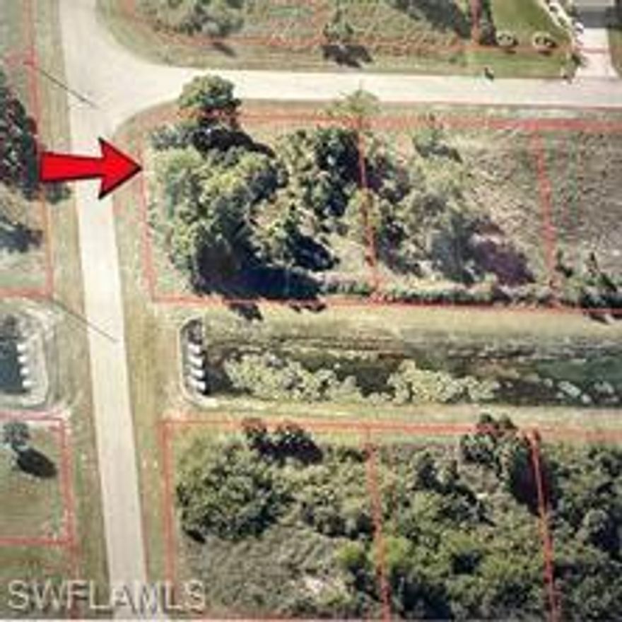 Lehigh Acres is booming in Lee County. This is your sign to purchase this oversized corner lot at .32 acres to build the home of your dreams or a duplex for investment purposes. The possibilities are endless. There's a creek in the back as well. Close to shopping and restaurants by 82 this location is ideal.