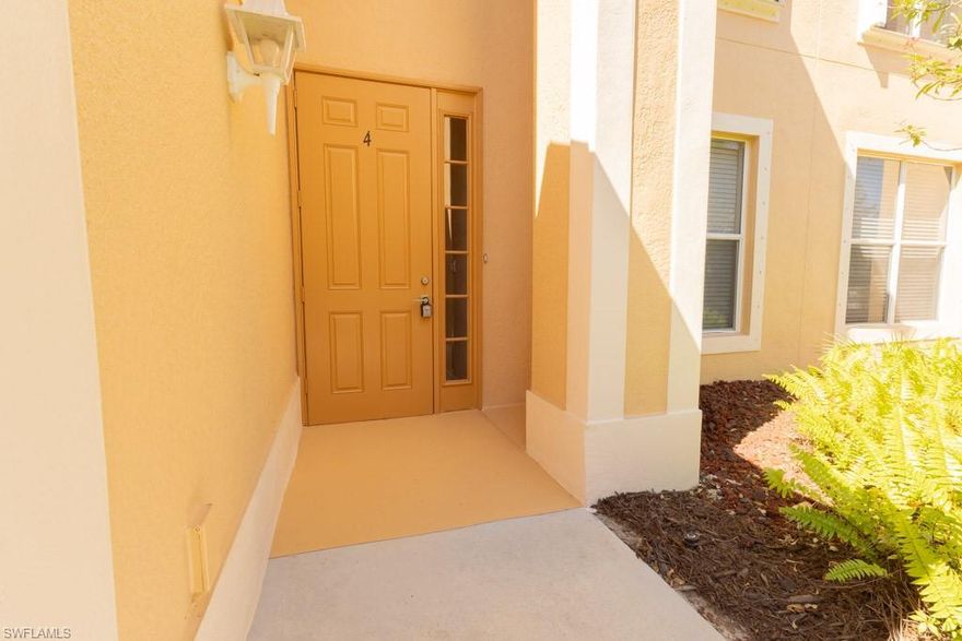 An open concept floor plan with a water view makes this coach home the perfect choice.  Located in the family friendly community of Moody River Estates, this 3 bedroom, 3 bathroom second floor home offers a unique floor plan that stands out from other nearby properties with a third bathroom creating a second primary suite. The home is move in ready and has a 2 car garage as well as an office/den with doors for privacy. Step into a chef's kitchen complete with stainless steel appliances, and plenty of storage. Enjoy the peaceful lake view from your enclosed lanai. New roof in 2024 and outside painting in 2025 as well as an all new upscale Moen faucet package installed throughout in 2026. Resort style amenities include two swimming pools, playground, fitness center, two tennis courts, boat ramp and a basketball court. You are just minutes from everything and there is even a free seasonal trolley service to shopping and dining in downtown Ft. Myers. This rare find is ready for you!