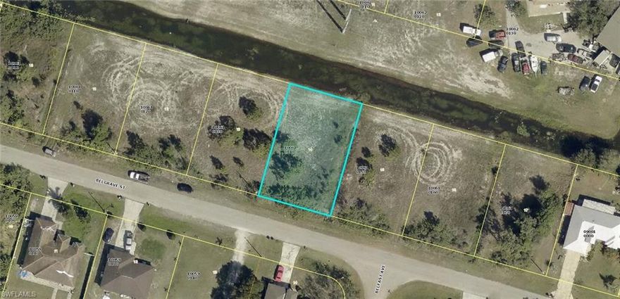 GREAT LOCATION! Unique SIDE BY SIDE lots located on a quiet paved street backed to a canal with utilities available just minutes from major amenities, and a quick commute in Fort Myers. The ADJACENT Lot 1229 belgrave st is also for sale with the potential to strap into 1/2 ACRE or build brand new homes side by side! Come build your DREAM HOME or INVEST today!