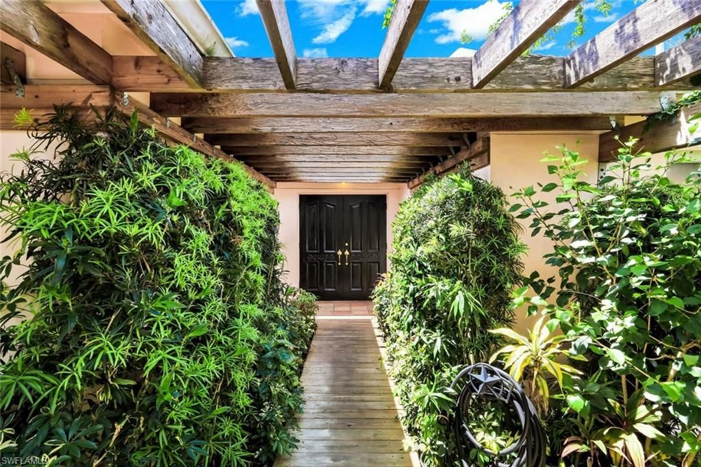 Photo of 330 BALD EAGLE DR #2, NAPLES, FL 34105 (MLS # 226014186)