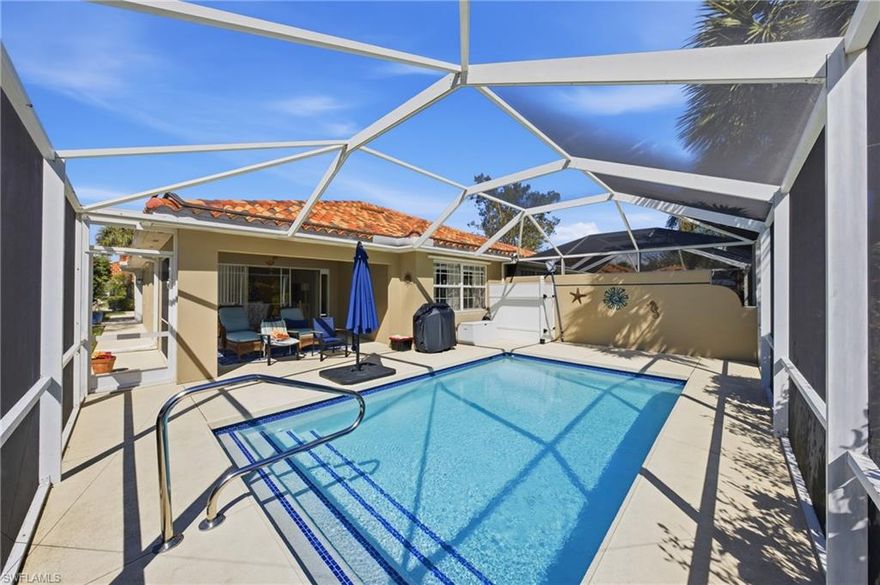 Rarely available Capri villa with a private solar-heated pool in the highly desirable North Naples community of Village Walk. Offering 1,540 square feet under air, this 2 bedroom plus den residence features the popular split bedroom floor plan, vaulted ceilings, and a two car garage.

The home has been lightly updated and features tile flooring throughout the main living areas, carpet in the bedrooms, and an updated kitchen with quartz countertops. Sliding glass doors open to an oversized screened lanai with southern exposure and a private solar-heated pool, creating a peaceful outdoor setting ideal for relaxing or entertaining. Electric hurricane shutters on the lanai provide added convenience and storm protection.

Major updates have already been completed including a newer roof, AC, water heater, and pool improvements, offering added peace of mind for the next owner. Positioned on a quiet street with lush landscaped views, the home provides privacy rarely found at this price point.

Village Walk is a gated North Naples community known for scenic walking and biking paths connected by Venetian-style bridges over lakes and canals. Residents enjoy resort-style amenities including a town center with restaurant, fitness center, tennis, pickleball, bocce, resort and lap pools, and a full calendar of social activities.

Ideally located just minutes to Vanderbilt Beach, Mercato, and some of the best shopping and dining in Naples. Private pool Capri villas in Village Walk are rarely available.