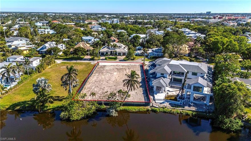 Experience stunning sunsets over the water from this highly sought-after .48-acre lakefront lot in the prestigious Ridge Lake neighborhood of Olde Naples. Boasting 105 feet of water frontage and a depth of 200 feet, this western exposure homesite offers an exceptional opportunity to design and build your custom luxury dream home.

Situated just a few blocks from Naples' renowned white, sugar-sand Gulf beaches, this prime location places you at the heart of the city’s most desirable attractions. World-class dining, upscale shopping, and vibrant entertainment are only minutes away at iconic destinations such as Fifth Avenue South, Third Street South, Venetian Village, and Waterside Shops.

This unique offering combines serene lakefront living with easy access to the best that Naples has to offer, making it an unparalleled opportunity for those seeking an exclusive lifestyle in Southwest Florida.