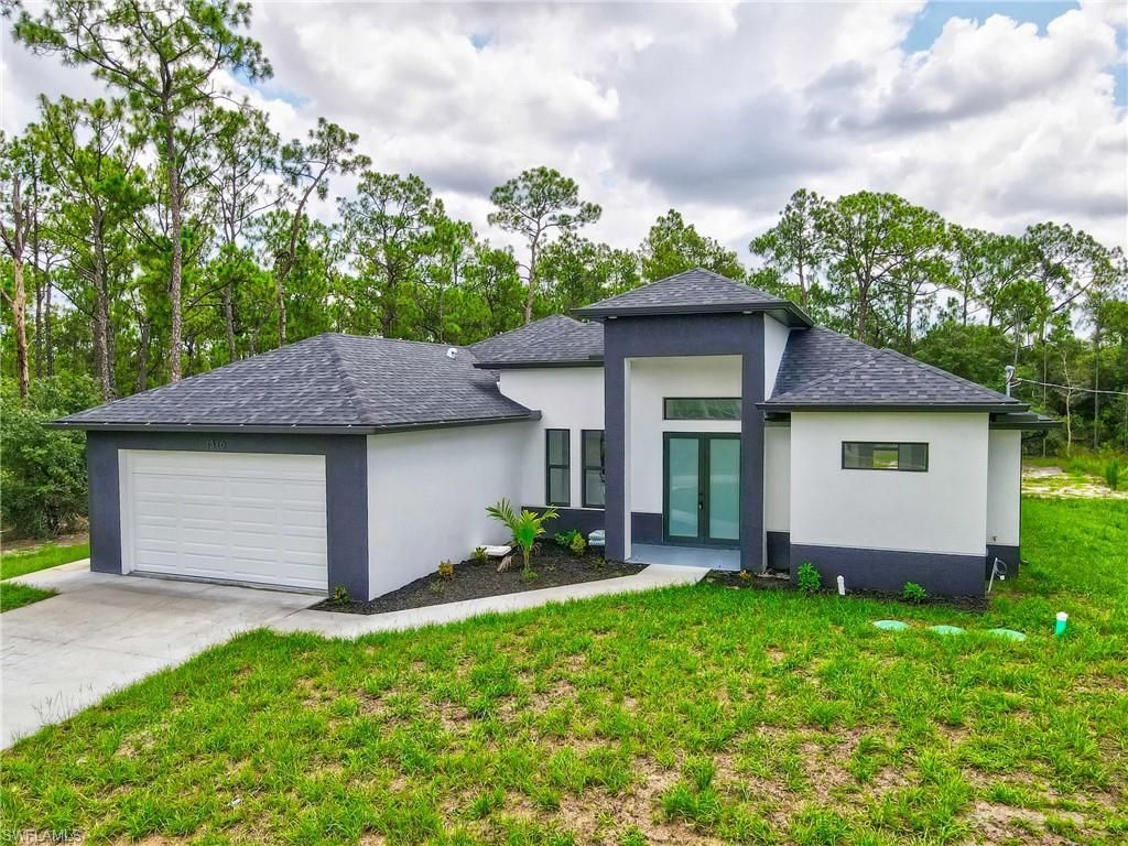 Photo of 1310 Acacia AVE, LEHIGH ACRES, FL 33972 (MLS # 2025017896)