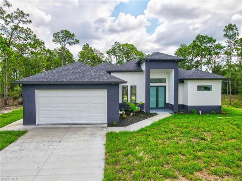 Photo of 1310 Acacia AVE, LEHIGH ACRES, FL 33972 (MLS # 2025017896)