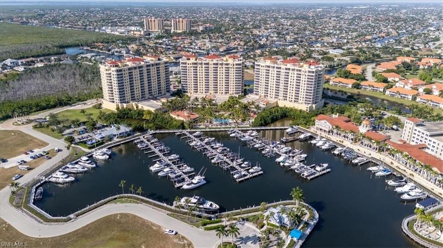Experience luxury living at its finest in this Davenport End Unit in Tarpon Point Marina. The Davenport end unit is the largest floor plan with 3,048 sq ft of living space, Featuring 3 spacious bedrooms, a den, and 3.5 bathrooms, with 3 balconies. Every room offers natural light and panoramic views of the water and surrounding upscaled neighborhoods, this custom designed residence boasts marble floors throughout, updated large gourmet kitchen & classy finishes that reflect the highest levels of taste and elegance, this property comes completely furnished turnkey, there is a two-car garage on the 2nd parking level for easy access to your private elevator, this waterfront community offers an unparalleled lifestyle with resort style amenities, beautiful private tropical community pool, waterfront dining, boutique shopping, 175 slip marina, fitness center, and vibrant entertainment just steps from the 5 star Westin Resort Hotel, the HOA maintains an A+ financial rating with fully funded reserves, this is truly a Luxury setting 1 mile from the Gulf of Mexico, 25 minutes to the airport, I-75 & 25 minutes to Fort Myers Beach!!