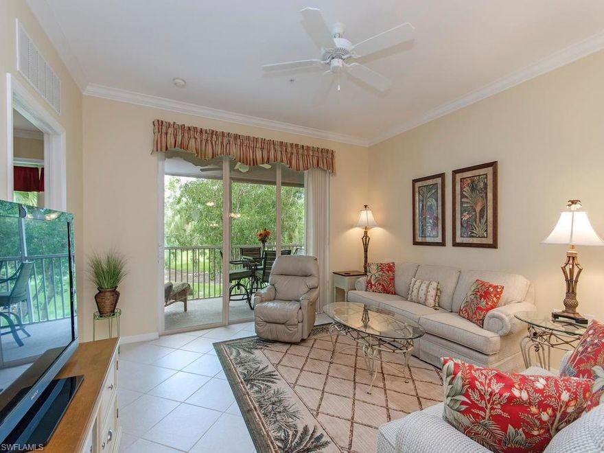 Best condo on the market in Bishopwood at Forest Glen! This meticulously maintained, second floor unit presents a beautiful southeastern, golf course and lake view -- and it is offered turnkey!  Upgrades and features include new stainless appliances, disposal, two-yr-old water heater, high efficiency a/c unit, condenser and lines (installed Oct 2014, 8 years left on warranty), hurricane impact glass on all windows and sliders, crown molding, chair rails and large tile in the living room.  Forest Glen is a bundled golf community with four Har-Tru tennis courts, clubhouse, exercise room and community pools. Only 1 mile to I-75 via 951. Close proximity to the beaches and Fifth Avenue shopping.  Don't miss this one – it won’t last long!