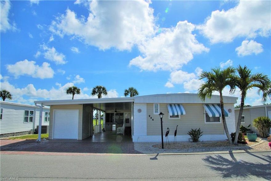 Perfectly positioned on the greens in Six Lakes Golf & Country Club, this beautifully updated residence enjoys sweeping golf course views and an abundance of natural light that instantly elevates the entire home. Offered turnkey and move-in ready, this home also includes a golf cart for effortless enjoyment of the community. With its sought-after setting, the backdrop is wide, open, and ever-changing—best experienced from the Florida room, where walls of windows frame the fairway and bring the outdoors in. Inside, the layout offers two distinct living spaces—a comfortable main living room and a sun-drenched Florida room perched along the course—creating flexibility for both everyday living and entertaining. The open-concept design has been thoughtfully reimagined, centered around an updated kitchen with a large island and bar seating. Soft-close drawers, pull-out cabinetry, a stylish backsplash, and GE appliances complete the space. A light, cheerful palette flows throughout, lending a subtle island-inspired feel, while large plank wood-style flooring runs through the main living areas and tile defines the Florida room for a clean, cohesive look. The guest bath has been thoughtfully updated with an updated vanity and tiled finishes, while the primary suite features a private ensuite bath for added comfort and convenience. Brick paver parking enhances the curb appeal, while electric hurricane shutters provide added peace of mind.  Six Lakes Golf & Country Club is a well-maintained, vibrant golfing community where the greens are as inviting as the camaraderie. With an active pro shop, thriving men’s and women’s leagues, and standout events like "Nine and Dine" and thrilling night-light golf, there’s always something exciting on the horizon for golf enthusiasts of all skill levels. Set in a prime location on the greens, this bright, thoughtfully updated home delivers easy, laid-back living with a view that truly sets it apart.