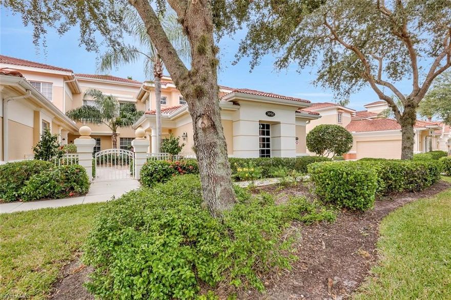 Located on the golf course!!  Rarely offered 3 bedroom, 2 bath end unit with attached 2 car garage.  Southern exposure.  Enjoy beautiful sunsets and golf course/lake views from your spacious wrap around lanai.  Fiddlers Creek is an award winning community with all the amenities you would expect - spectacular club house, resort style swimming pools, spa service, fitness center, tennis and great restaurants.  Optional golf, beach and marina memberships available.