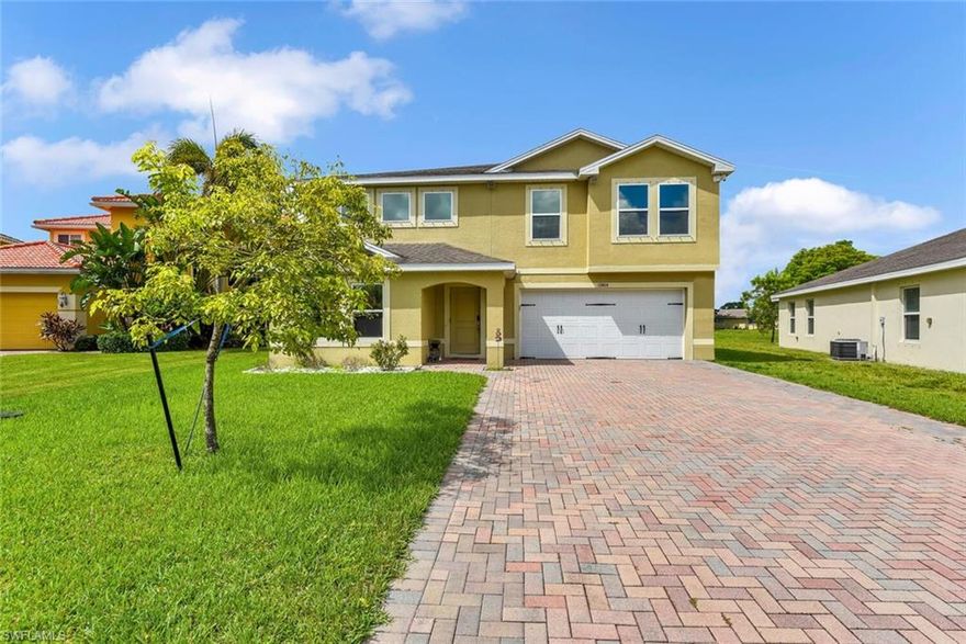 Fantastic sprawling layout! This 2-story design is situated on an oversized lot in a gated community. The first floor offers a formal front sitting room, formal dining room, open concept kitchen w/ breakafast nook, custom sliding barn doors on sliders to lanai, family room, guest room, full bath, and a 2-car garage w/ a/c & epoxy floor. On the second floor you will find a massive bonus room, laundry room w/ storage, master suite, 3 guest rooms, and one full bath. This home absolutely has enough room for everyone in the family and has plenty of room to add a pool. Generator hook-up and manual shutters available for optimum storm protection. There is an alarm system w/ cameras & RING system for home security. The a/c unit is only 1 year old. Marblebrook has a lakefront community center, is close to lots of shopping/dining options, and is right across from the Veterans Park which offers tons of activities!