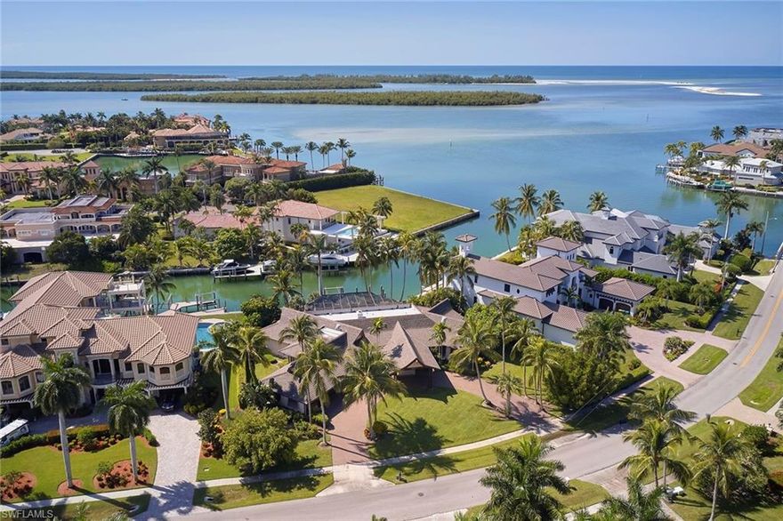 This home embodies the essence of the true island lifestyle set amongst a beautiful, tropical .55-acre, direct-access, southern-exposure lot on prestigious Caxambas Court in the estate area of Marco Island. This Polynesian-inspired residence is truly special, feels like home and has incredible potential to make like-new again. Offering beautiful views of the waterway out to Caxambas Pass, area Islands and the Gulf of Mexico. With nearly 3,400 air-conditioned square feet, the home features three bedrooms, two-and-a-half baths, newer roof, fireplace, wet bar, lovely kitchen, abundant windows throughout, oversized laundry room with desk/hobby space, plantation shutters and so much more. The spacious lanai offers a large freeform pool, spa (not working), lovely landscaping, private setting and tranquil views. From your dock, you will have immediate, direct access to endless adventure, amazing sightseeing, exploring, fishing and adventure. Beautiful front entry with circular drive, porte-cochère and 3-car garage. The home is being sold as-is.