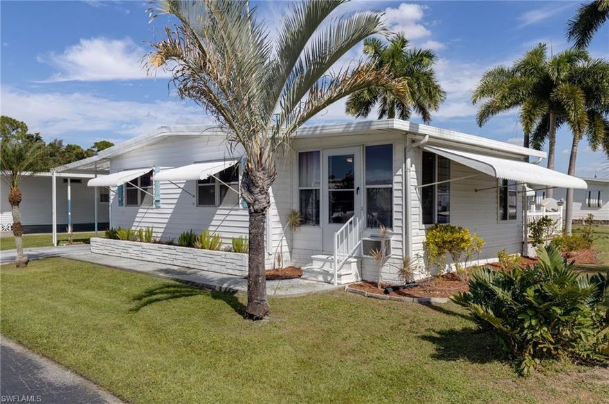 Welcome to your new home in Lazy Days Village where you own your lot! This spacious manufactured home offers the perfect blend of comfort and convenience. With 2 bedrooms and 2 bathrooms, there is plenty of space for you and your loved ones to relax and unwind. The large carport with attached large laundry storage room offers practicality and convenience. With over 1000 sq. ft. of living space, this home feels spacious and inviting. The dining area is perfect for hosting dinner parties or enjoying a quiet meal at home, while the large living room provides ample space for entertaining guests or simply relaxing after a long day. Situated on a large corner lot in a land-owned park, you can enjoy the privacy and tranquility of your own space. The Florida sunroom is the perfect spot to enjoy your morning coffee or relax with a good book while looking at the relaxation pond.  The new outside porch offers a relaxing place to enjoy comfortable Florida evenings.   The community pool provides the perfect spot to cool off on those hot Florida days and socialize with neighbors.  The low monthly HOA fees make this home an affordable option for those looking to enjoy all that Lazy Days Village has to offer.  Don't miss out on this incredible opportunity to own a piece of paradise in Lazy Days Village. Come see this beautiful home today and start living the Florida lifestyle you've always dreamed of!