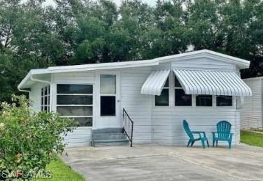 Excellent location! Affordable Living! Plus, YOU OWN the LAND! Thank you for viewing 5 Bass Lane in Imperial Wilderness Condominium Association---a gated 55+ community that is conveniently located! It is approximately 2 miles to shopping and restaurants, 8 miles to Marco Island beaches, and 10 miles to Naples beaches. This 2Br/1.5Ba home offers a spacious kitchen, living room with a sleeper-sofa, and furnishings that stay. Since 2024 the following updates occurred: stainless-steel appliances, A/C, vinyl roof-over, backdoor, siding, some windows, some flooring, and the LR ceiling fan. The HOA fee of $898. per quarter is very reasonable and covers many of your needs: water, lawn care, basic cable, trash/recycling, and community amenities. Community amenities include the following: 2 pools with spas, bocce, pickleball, pétanque, tennis, shuffleboard, billiards, ping pong, a library, clubhouse, dog parks, and an extremely active events calendar!