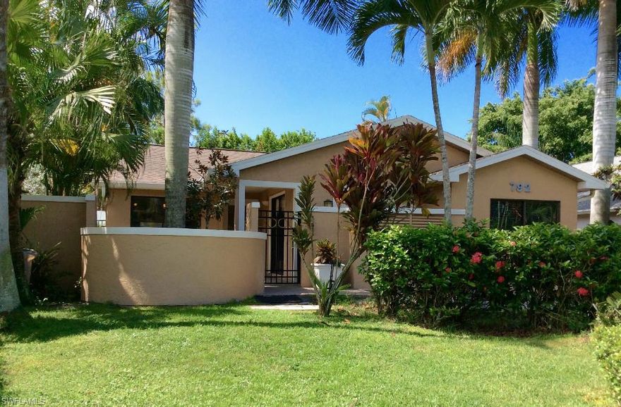 Welcome home to this charming, contemporary and delightfully unique courtyard home in the heart of Naples Park.  Location, location!, Beaches, upscale shopping, restaurants, Mercato, Whole foods and more. This home presents a tropical pool area which is inviting, private and peaceful. The interior of the home has a sophisticated flair, freshly painted inside and out, entry foyer, guest area and bath. Appointments include: Granite counter tops, glass block walls, marble and stone accents, volume ceilings, dimmer controlled recessed lighting, Iron gate courtyard entry, Italian stone mirrored walls and more. The Master bed area is sunken with glass doors to the open, covered outdoor area and pool area and lots of closet space. Home is spacious with extra room used for office/den/exercise or convert to garage.There are some newer appliances and AC unit is under 4 years old. This home is a jewel in Naples Park.  3rd bedroom closet was converted to shelving unit but can be converted back to accomadate 3rd bedroom.