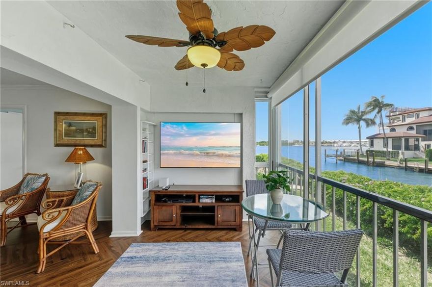 Step into this move-in-ready, well maintained, fully updated condo and experience the best of Naples waterfront living. This 2-bedroom, 2-bath home sits directly on a canal with partial Naples Bay views, overlooking the Tin City area—and offering stunning sunsets each evening from the comfort of your own space.

With 5th Avenue South, 3rd Street, and multiple Gulf beach access points just 5–10 minutes away, you’ll enjoy unmatched proximity to Naples’ top boutiques, restaurants and pristine beaches.

A deeded 26' boat dock is included, providing direct access to the bay. Cruise to Tin City or Bayfront for dinner, fish the nearby mangroves or open Gulf, or head to famous Keewaydin Island—just a short ride by boat.

The condo features a long list of recent upgrades: brand-new hurricane-impact windows with a transferable warranty, a new roof and electrical service, updated kitchen and bathrooms, a new soaking tub, new flooring, and a 2-year-old AC system and appliances. The community pool is being fully renovated, and the assessment has already been covered.

This is a rare opportunity to own a beautifully updated waterfront home in a prime Naples location—without the long commute from the outskirts. Whether you’re seeking a vacation getaway or a full-time residence, this condo offers convenience, comfort, and nightly sunsets that make every day feel like a getaway.