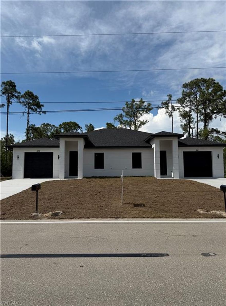 Welcome to this New Construction, one-of-a-kind duplex featuring top-of-the-line craftsmanship and modern design throughout. Each unit is about1,200 Sqft of living and About 1,600 total Sqft .Each unit offers 3 spacious bedrooms and 2 full bathrooms, providing a comfortable and functional layout ideal for both homeowners and tenants. Built for durability, the property features hurricane-impact windows and doors for enhanced safety and energy efficiency. Interior finishes include elegant quartz countertops in both kitchens and bathrooms, paired with sleek porcelain tile flooring that runs seamlessly throughout each unit for a clean, modern look and easy maintenance. The kitchens truly stand out with unique finishes, soft-close cabinetry, and contemporary design elements that flow effortlessly into the living and dining areas—perfect for entertaining or everyday living. The low-maintenance exterior ensures ease of ownership, while the prime location offers close proximity to shopping centers, including Walmart and Publix, as well as nearby public schools. Whether you choose to live in one unit and rent the other or lease both for maximum income potential, this duplex offers outstanding flexibility and investment value.  Schedule your showing today!