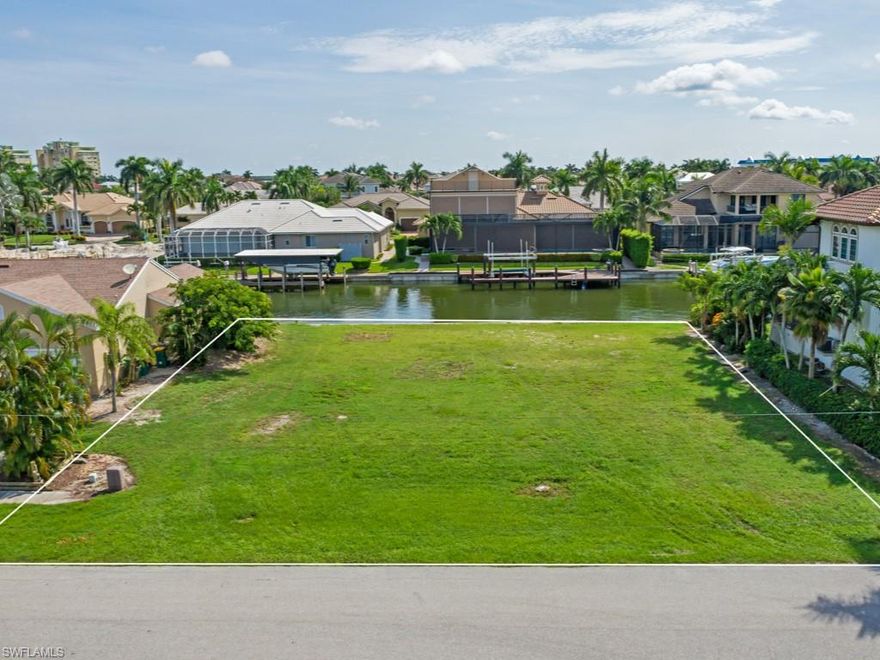Magnificent water direct lot (no bridges by boat) located in one of the most beautiful and highly-desired neighborhoods at Marco Island!  This generous parcel has 100’ of seawall, plenty of space for a 3-car garage, large pool & pool deck and stately future residence.  Offering super fast access to prestigious Collier Bay and beyond to the Gulf of Mexico by boat, this vacant parcel is the perfect place for your tropical dream home.  This outstanding lot in this popular area won’t last long, so hurry!  Close to wonderful restaurants, entertainment and shopping, too!
