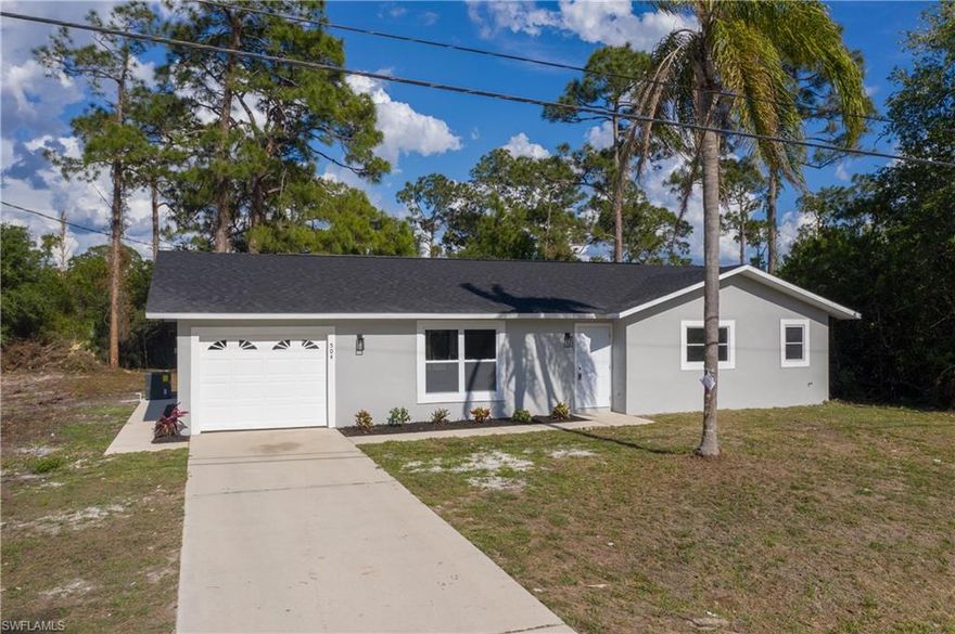 MULTIPLE OFFERS! HIGHEST AND BEST BY 4/21/2022 5PM. Stop, look no further! This property is an absolutely showstopper! This property has been totally renovated from top to bottom. Step inside, amazing wood plank tile throughout the entire house with 5 inches base board give it just right modern feel it. Vaulted ceiling and huge space with Open concept kitchen give it great practical space for family and friends gathering and party. Kitchen carries brand new hardwood cabinets with soft closing feature, beautiful quartz countertop, and marble backsplash as well as stainless steel appliances make this home stand out from the rest of the houses in the area. Bathrooms has been totally redone with new tile showers, new toilets, new vanity, and brand-new LED lightings throughout the entire house. Property also has brand new roof, AC and new stucco, as well as two new water filters system just installed, new owner doesn’t need to worry about these expensive items any more for many years to come. The best part is the yard space for this property, amazing half acres yard provide endless possibility to enjoy the Florida outdoor living style! Hurry up before this is gone!