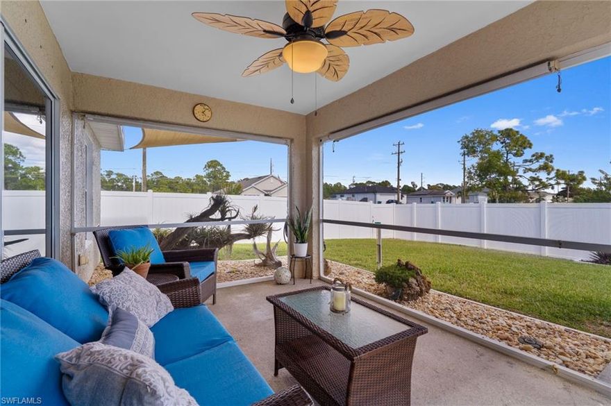 CORNER LOT - OPEN-CONCEPT LAYOUT - ROOF & HVAC RECENTLY UPDATED. This well-maintained 3-bedroom, 2-bath home sits on a quiet street in Cape Coral and offers privacy and comfort with a partially fenced yard and beautiful landscaping. Inside, enjoy a bright white kitchen with center island that opens to the main living area, creating a welcoming space for everyday living and entertaining. The primary suite features a large closet and private en-suite bath, while ceiling fans throughout add year-round comfort. Step outside to a screened-in lanai with a tranquil water feature, perfect for relaxing or hosting guests. The garage includes a workbench with additional storage, ideal for hobbies or organization. The roof (approx. 4 years old) and HVAC (approx. 5 years old) provide added peace of mind, and the property is not located in a flood zone. Located in a quiet Cape Coral neighborhood, this home offers easy access to shopping, dining, parks, and major roadways, making it ideal for a first-time homebuyer or seasonal resident seeking a relaxed Florida lifestyle. Schedule your showing today! THIS PROPERTY QUALIFIES FOR A 1% LENDER INCENTIVE IF USING PREFERRED LENDER, INQUIRE FOR MORE DETAILS**