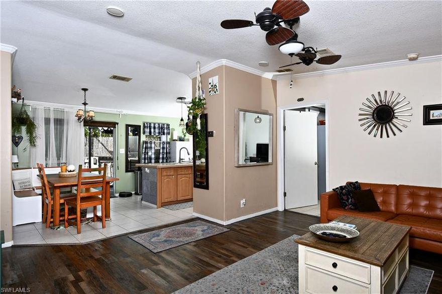 Welcome to your ideal residence! This delightful 3-bedroom, 2-bathroom home is a hidden treasure. The focal point is the stunning kitchen, designed for culinary enthusiasts to delight in and effortlessly entertain guests. Upon entry, you'll find a welcoming living  space, new flooring throughout the house. The master suite features a very nice walk-in closet, walk-in shower, and the added luxury of a tub and dual sinks. Nestled on a generous half-acre lot, you have plenty of room for a pool. Start your day with a cup of coffee on the charming 10x10 front porch or host lively BBQs on the expansive 10x24 back porch, perfect for outdoor socializing. This property offers a harmonious blend of coziness and elegance. Don't miss the opportunity to make this house your home sweet home!