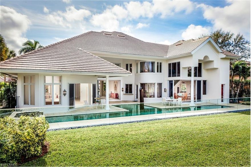 This outstanding opportunity within the coveted community of Bay Colony Shores provides value, lifestyle, and room for friends and family to gather.  With five bedrooms, five and two half baths and a picturesque lakefront setting, this home features a 65-foot lap pool, gracious master suite complete with sauna, all en-suite bedrooms and glass fencing with unobstructed views of nature from all rooms. Within the guarded community of Bay Colony an enviable lifestyle awaits with a private beach club, active tennis and social mingling. 339 Cromwell Court represents Bay Colony’s best value—don’t delay a move today!