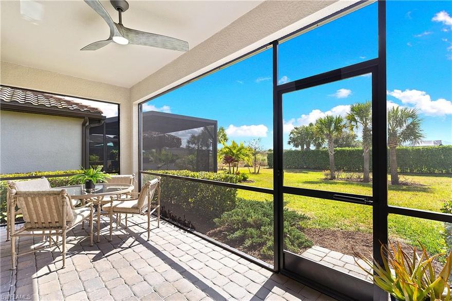 PRICED TO SELL, THIS IMMACULATELY KEPT “TREVI” WITH SOUTHERN REAR EXPOSURE AND LARGE BACKYARD IS NOW AVAILABLE IN THE PLACE AT CORKSCREW! This Residence features 4 Bedrooms, 3 Full Bathrooms (1 Guest Bedroom has an EN-SUITE Bath), 2,032sf living area + 149sf outdoor living space. As you enter the home, you’ll immediately notice how BRIGHT and CLEAN it is. The front door with DESIGNER GLASS INSERT allows the sun to pour into the home keeping it full of light throughout the day. Porcelain tile flooring flows seamlessly through the main areas of the home. In the center of the home, you'll find a NICE SIZED KITCHEN with rich brown cabinetry accented by Carrara style subway tile BACKSPLASH and matching tile on the face of the LARGE KITCHEN ISLAND, along with STAINLESS STEEL APPLIANCES and upgraded LG FRENCH DOOR REFRIGERATOR, which elevate the style and functionality of the space. The WALK-IN PANTRY provides abundant storage for dry goods and small appliances. The kitchen is joined by the dining and Greatroom in this OPEN CONCEPT home which creates an ideal entertaining space for hosting gatherings with family and friends. Enjoy INDOOR/OUTDOOR ENTERTAINING when you open the glass sliding door to the screened covered lanai. The lanai overlooks your large backyard with tons of green space! Build your own DREAM OASIS with a custom pool and spa, or FENCE THE YARD for your kids and pets to play, or do BOTH! The extra distance on the side of the home provides for convenient access so equipment can easily get to the back of the home. The SOUTHERN REAR EXPOSURE homesite will provide sun on your backyard and/or pool all year round. Inside, you’ll enjoy a SPACIOUS PRIMARY SUITE with DUAL CLOSETS and bedside views of your backyard. The Primary Bathroom boasts a large vanity with granite countertop and twin sinks, an OVERSIZED ENCLOSED SHOWER, linen closet and private water closet. Your guests will enjoy the accommodations provided by either the private EN-SUITE Bedroom (bath showcases a tub with HEAVY GLASS ENCLOSURE) or the secluded split bedrooms that share a hall bath with tub. The laundry boasts UPGRADED LG FRONT LOADING WASHER/DRYER The garage comes complete with a GE refrigerator for added food storage. THIS PROPERTY IS HIGH AND DRY AND LOCATED IN FLOOD ZONE X... NO FLOOD INSURANCE REQUIRED! The amenities at The Place at Corkscrew are second to none!... Resort Pool w/100' Waterslide & Spa, Indoor Restaurant and Bourbon Bar, Cafe, Outdoor Bar, Fitness Center, Movement Studio, Tennis, Pickleball, Bocce, Basketball, Playground, Dog Park, Childwatch, Spa Services, 2 Entry Gates. Just Minutes to Schools, Shopping, Restaurants, Airport, Beaches. For GOLF ENTHUSIASTS, the highly rated Jack Nicklaus designed OLD CORKSCREW GOLF CLUB is open to the public and located across the street from the community! NEW PUBLIX GROCERY STORE PLAZA, JUST 1.4 MILES AWAY! OTHER TENANTS INCLUDE DUNKIN DONUTS, UPS STORE, LEGNO ITALIAN RESTAURANT, NAIL SALON, DENTAL OFFICE, AND MORE!