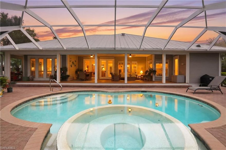 Beautifully maintained pool home in the highly desirable Caloosa Creek community, ideally located on a spacious corner lot with a circular driveway and classic side-loading garage. This residence reflects the relaxed, coastal character that Caloosa Creek is known for while offering numerous thoughtful upgrades and quality finishes throughout.
The home features a functional split floor plan with three bedrooms, three full bathrooms, and a flexible space that can serve as a large office or formal dining room, accessed through elegant French doors. Two of the bedrooms offer en suite bathrooms, and one of the bathrooms also serves as a convenient pool bath with direct lanai access.
At the center of the home is a beautifully updated kitchen designed for both everyday living and entertaining. The spacious layout includes an island, 42-inch cabinetry, high-end appliances, a Viking gas stove with professional hood, wine cooler, and generous counter space. The kitchen opens naturally to the living areas, where a wood-burning fireplace creates a warm and inviting atmosphere.
Large-format windows and wide glass openings that maximize natural light connect the interior spaces to the expansive outdoor living area. The oversized screened lanai overlooks a private pool with a striking 360-degree spillover spa, creating a true Florida outdoor retreat.
The primary suite offers a peaceful setting with nine-foot ceiling height, plantation shutters, and views toward the pool and lanai.
Additional features include 8-foot interior doors, plantation shutters throughout, impact glass windows, electric shutters protecting the front entry and rear of the home, a whole-house generator supported by a 500-gallon underground propane tank, a new air conditioning system installed in October 2024, and a new water heater. The spacious side-loading garage is air conditioned and provides room for two cars, a golf cart, and a dedicated workshop area.
The front porch has been upgraded with new Trex decking, adding durability and a refined look to the home's welcoming entrance.
Caloosa Creek is a gated community located just minutes from the Sanibel Causeway, offering an established neighborhood setting with mature landscaping, privacy, and convenient access to Fort Myers, beaches, and waterfront recreation.